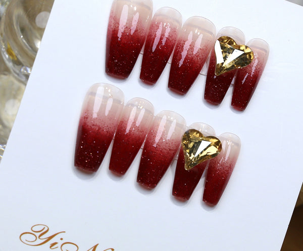 Celebrate your love story with elegance! Match Nails Love Sonata features romantic ombre with golden heart wedding press-on nails.