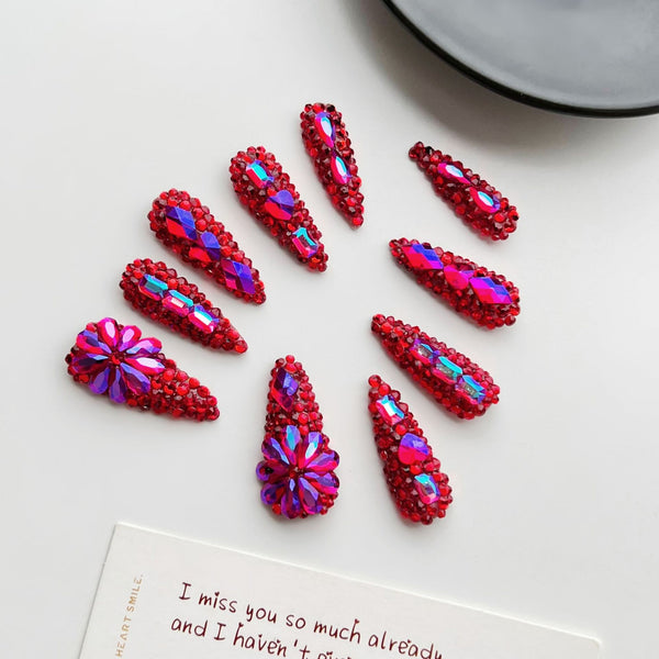 Match Nails red almond nails with glitter