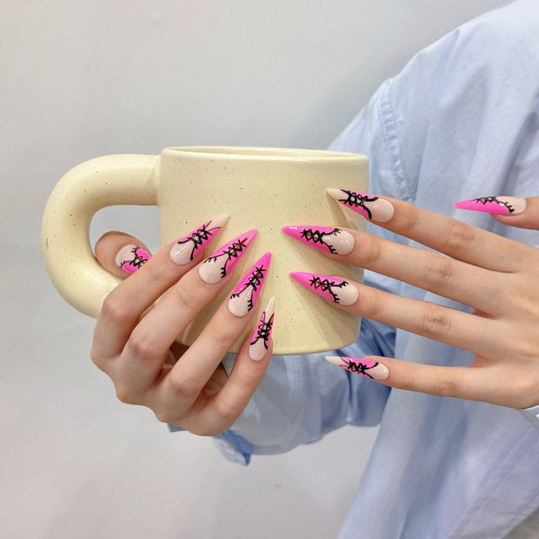Match Nails nude and pink nails in hands with a cup
