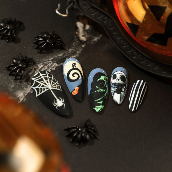 Halloween nail art featuring ghost almond designs