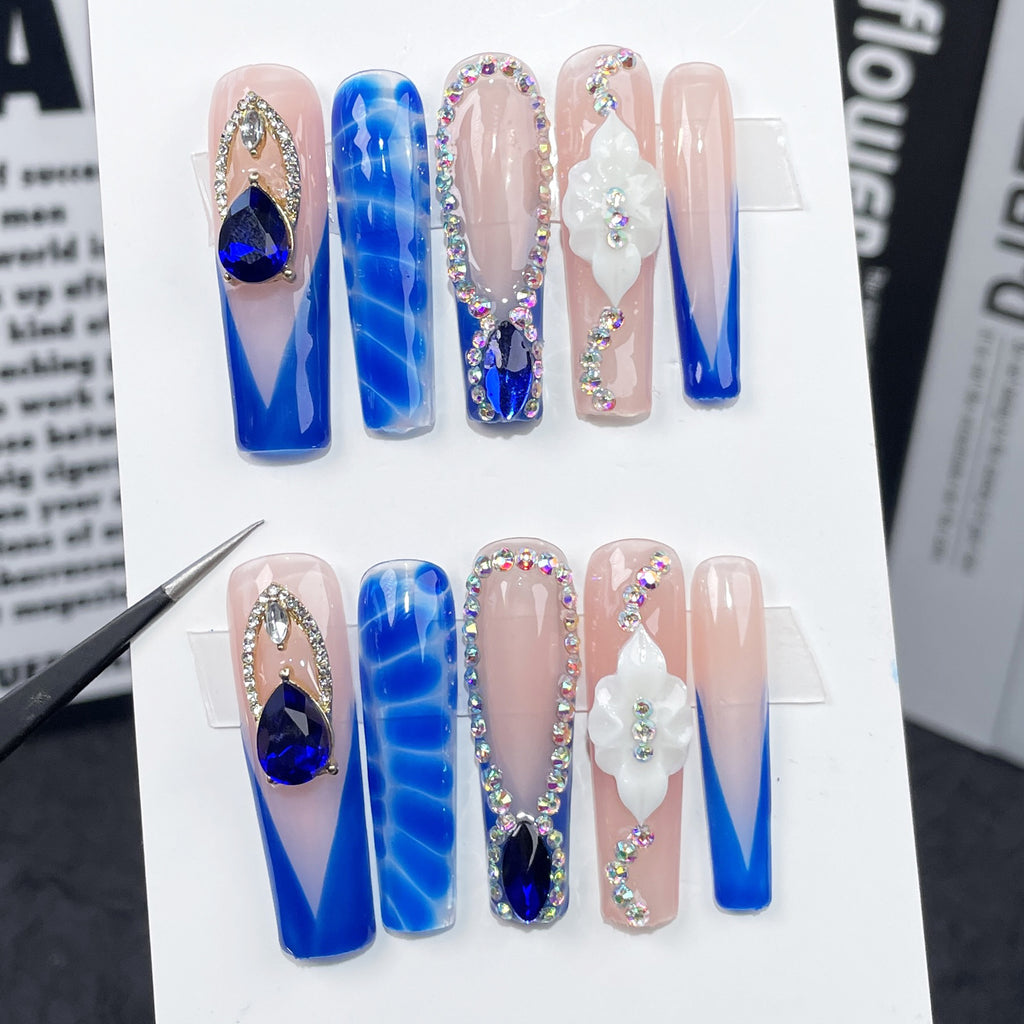 Match Nails Unconventional Elegance: Pink & blue marble coffin wedding nails for the modern bride.