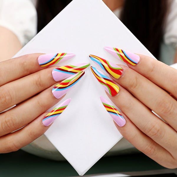 Match nails rainbow stiletto swirl nails