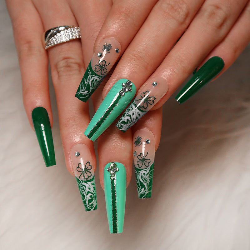 Match Nails Emerald Isle: Effortless St. Patrick's Day nails with long glossy coffin emerald green false nails.