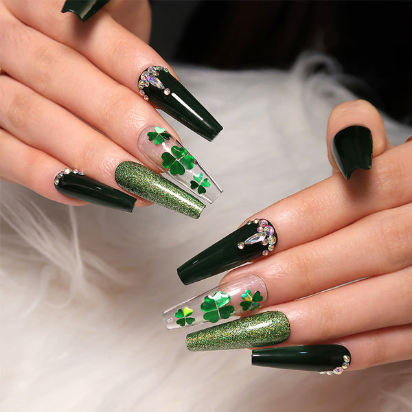 Celebrate in style! Match Nails Emerald Elegance features long-lasting long coffin classy emerald green press-on nails for St. Patrick's Day.