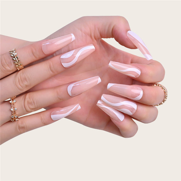 Dreamy nails in minutes! Match Nails Dreamscape Pink features long-lasting glossy pink swirl long coffin press-on nails.