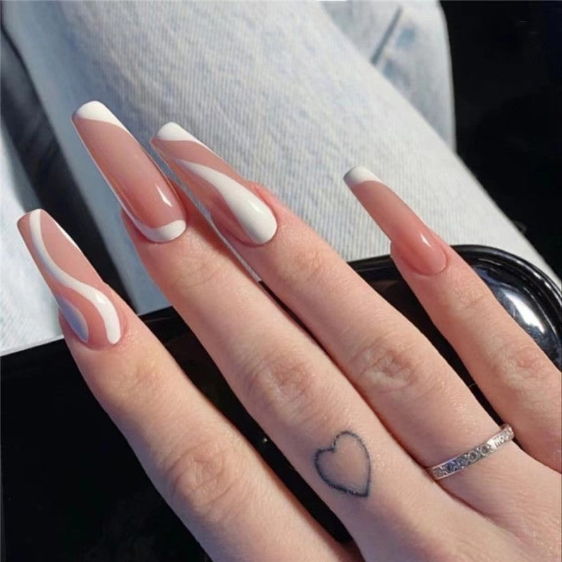 Match Nails Dreamscape Pink: Effortless elegance meets playful swirls with long glossy pink coffin press-on nails.